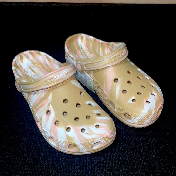 tan and pink crocs